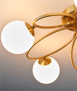 Oval Circles and 5 Glass Globes Flush Mounted Light
