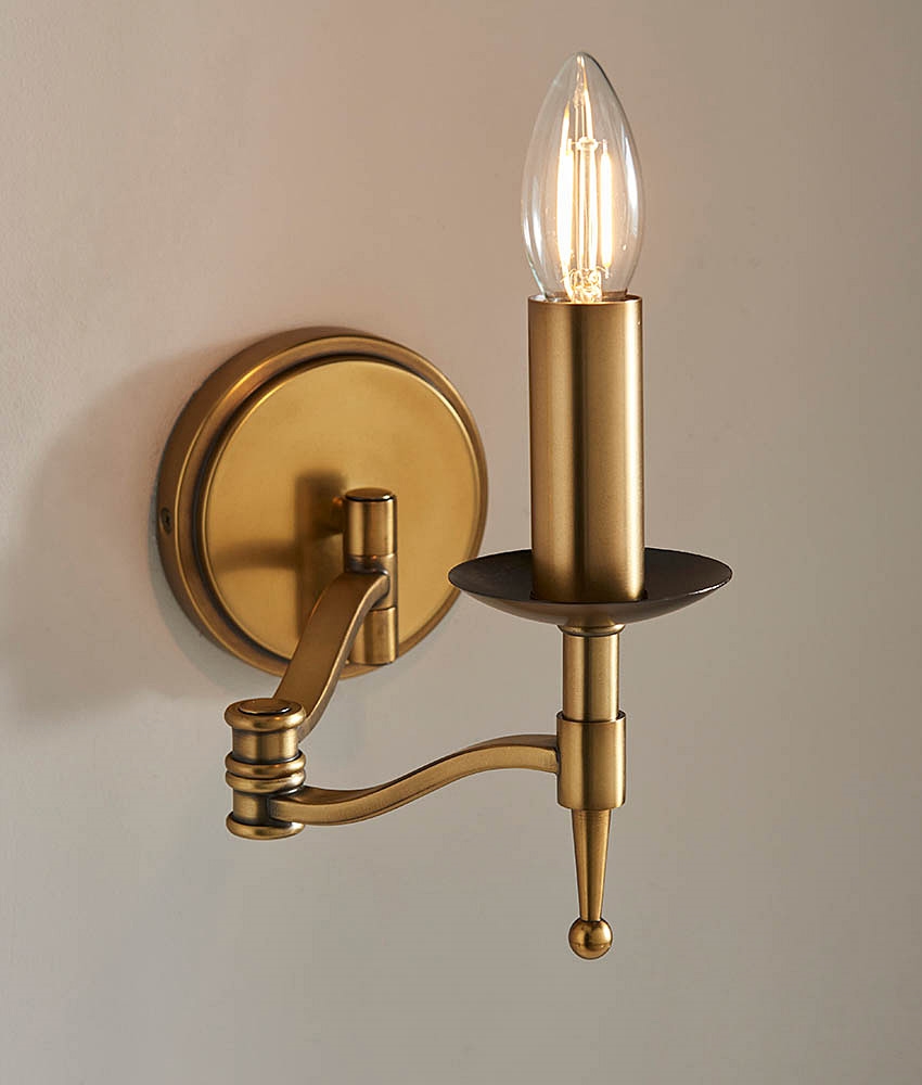 Swing Wall Light in Antique Brass Finish