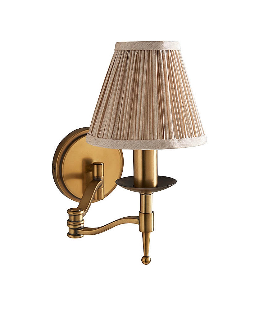 Swing Wall Light in Antique Brass Finish