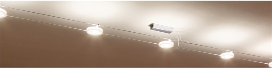 Tension wire lighting